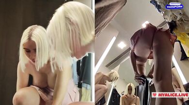 Young blonde shows big tits in the dressing room. See throuhg clothes