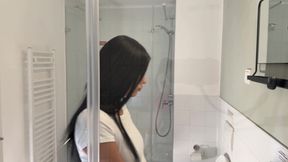 Hot sexy slim tight pussy beauty in the bathroom prepares for night out in a pink cut mini skirt