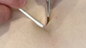 Close Up Stretched Out Belly Button Play With Objects