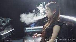 Elegant Asian Woman Chain-Smoking Cigarettes During Candid Q&A Session — TAO1 4K