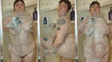 Thick white girl soapy tits jiggle in the shower while she teases her pussy