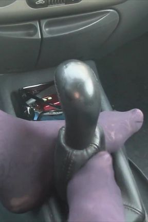 Nyllady's Footjob to Gearshift and Wheel in Patterned Pantyhose