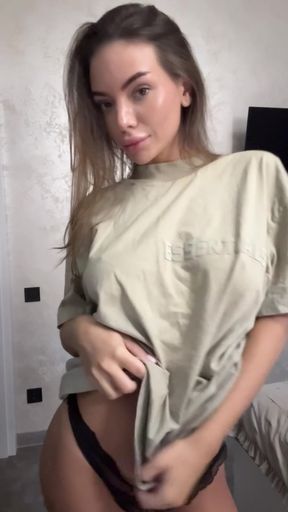 Cute amateur babe shows off her big natural tits