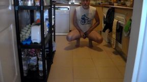 John is peeing on the kitchen floor