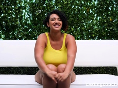 Busty curly brunette with big boobs fucks on couch