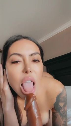 Lela Star rides a BBC in reverse cowgirl position