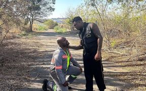 Vigilante Humiliating the Worker