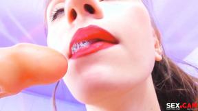 ”(16:9) Kinky Babe suck her Dildo with passion”