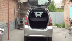 cleaning my car with blue vacuum