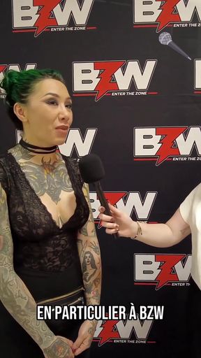Asian wrestling babe shows off her huge tatted boobs