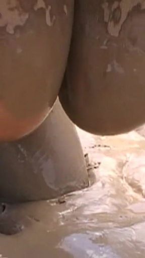 Julie's Tits Drowned in Mud Wriggles Like a Filthy Worm Sploshing Fun