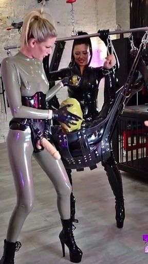 Three Ladies Gangbang a Rubber Whore