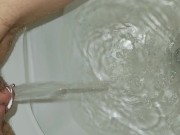 Up close peeing