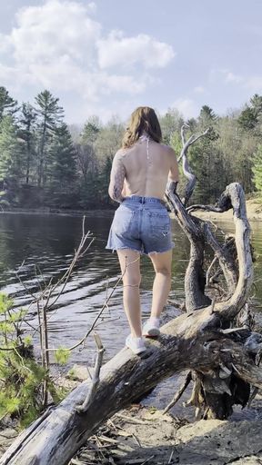 Wet GF removes her shirt near a body of water