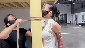 Chinese Girl Standing Bondage Tied To A Pole
