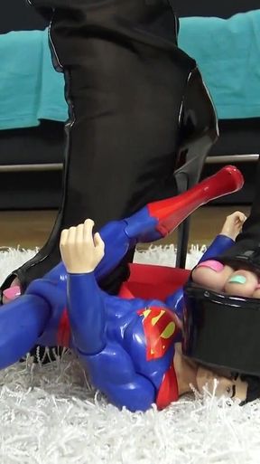 Superman Crush! Cruel Reell Crushes Superman Symbolically for All Men!