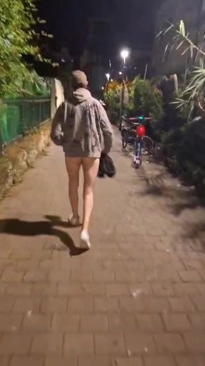 Naked walking along the road near bus station