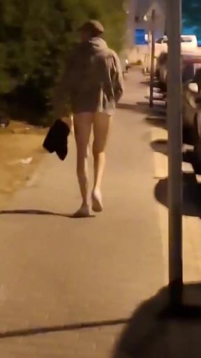 Naked walking along the road near bus station