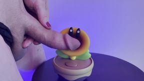 Hot Glue Covering Toy Figure in Cum