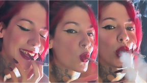 Very close up, Emilia smoking Sobranie C