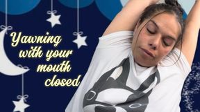 Yawning with your mouth closed