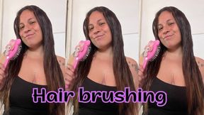 Brushing my long brunette hair