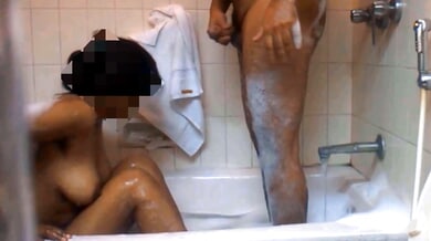 Indian man takes his lover standing in a steamy hotel bathroom