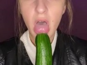 Cucumber sucking. Leather jacket