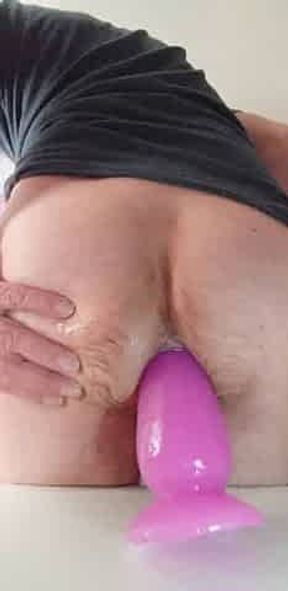 Playing with my 2 biggest dildos