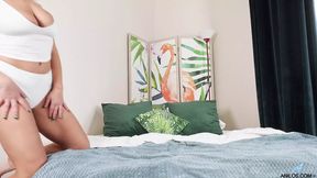 Top-heavy blonde strips and displays off big jugs and behind