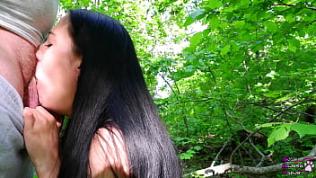 Young black-haired slut swallows fat uncut cock in the forest