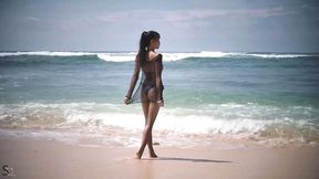 Cute Asian teen IyaQ shows off her godlike naked body on the beach